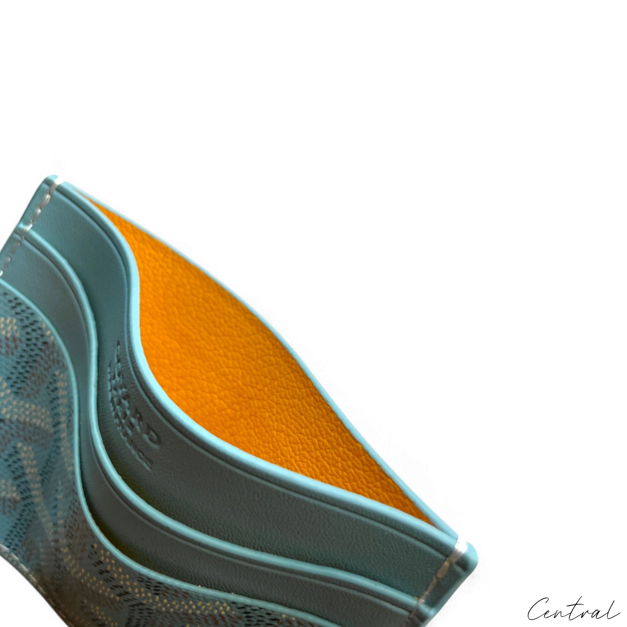 Goyard baby blue card holder featuring signature pattern and sleek design, ideal for stylish organization.