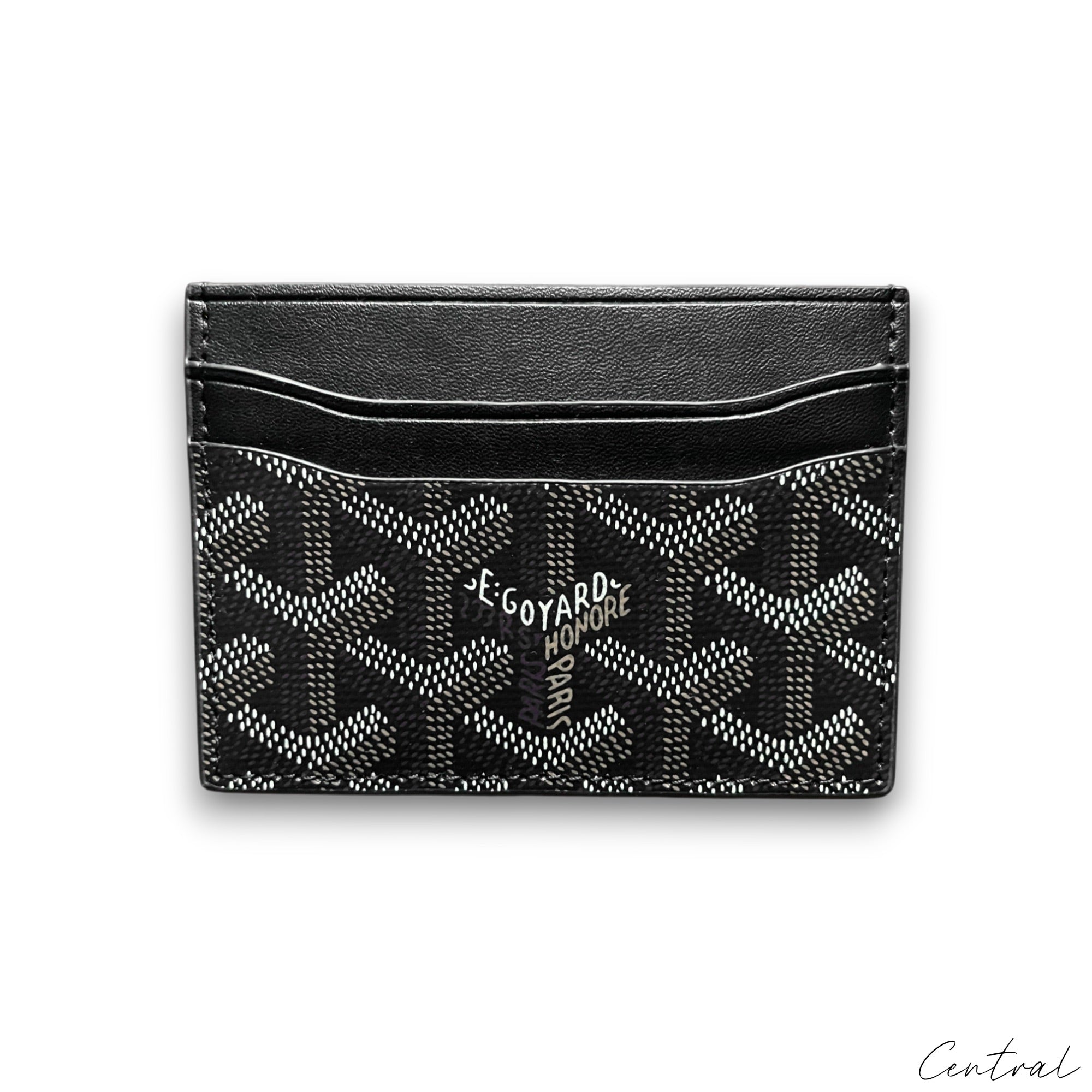 Black Goyard card holder featuring iconic pattern and minimalist design, perfect for holding essential cards.