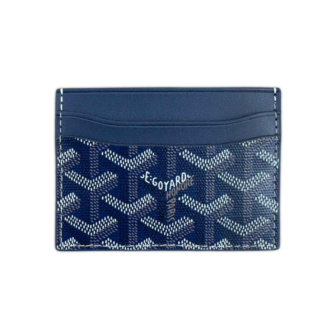 Classic Royal Blue Goyard card holder with signature pattern and sleek design, displayed on a neutral surface.