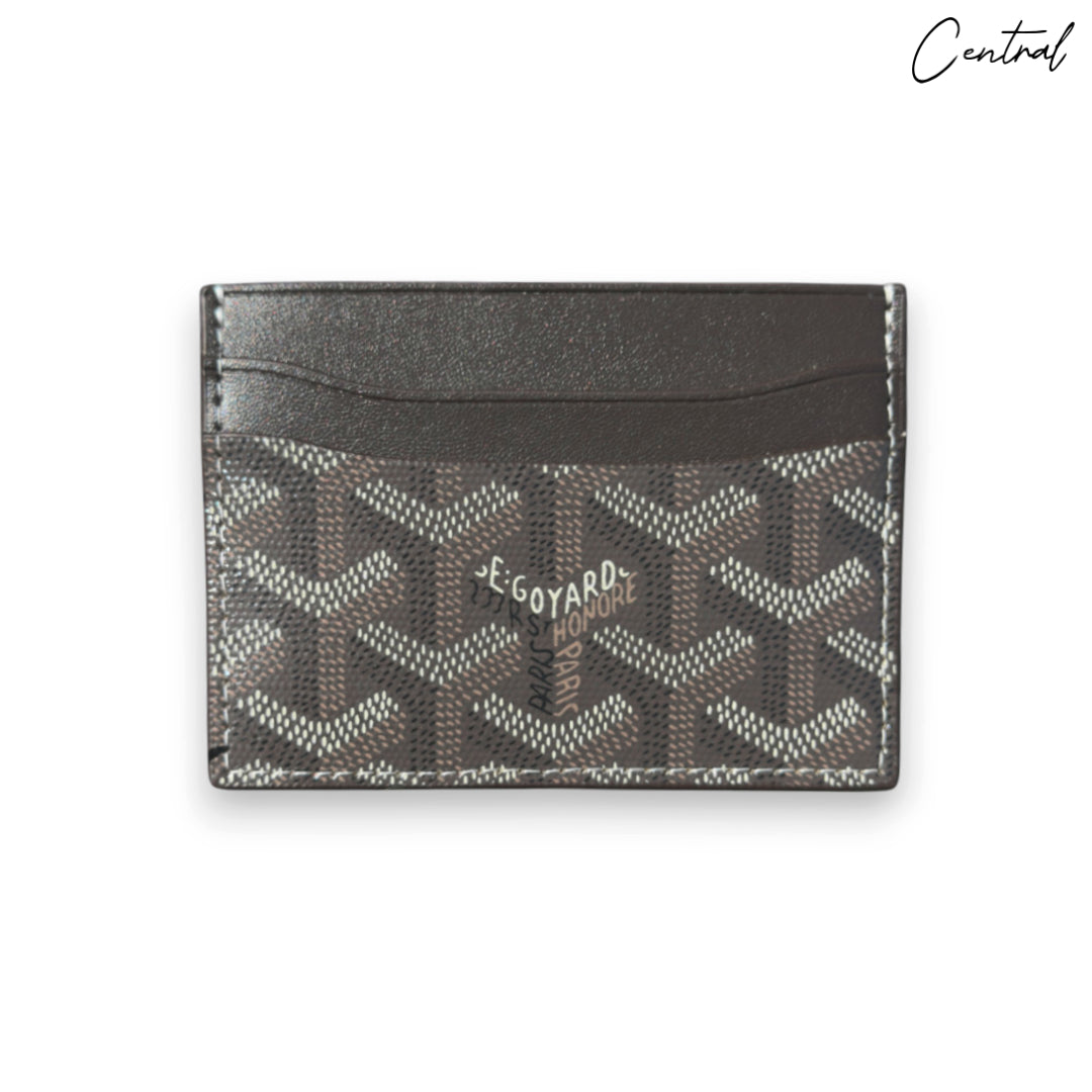 Coffee brown Goyard card holder featuring a sleek design and signature pattern, ideal for stylish organization.