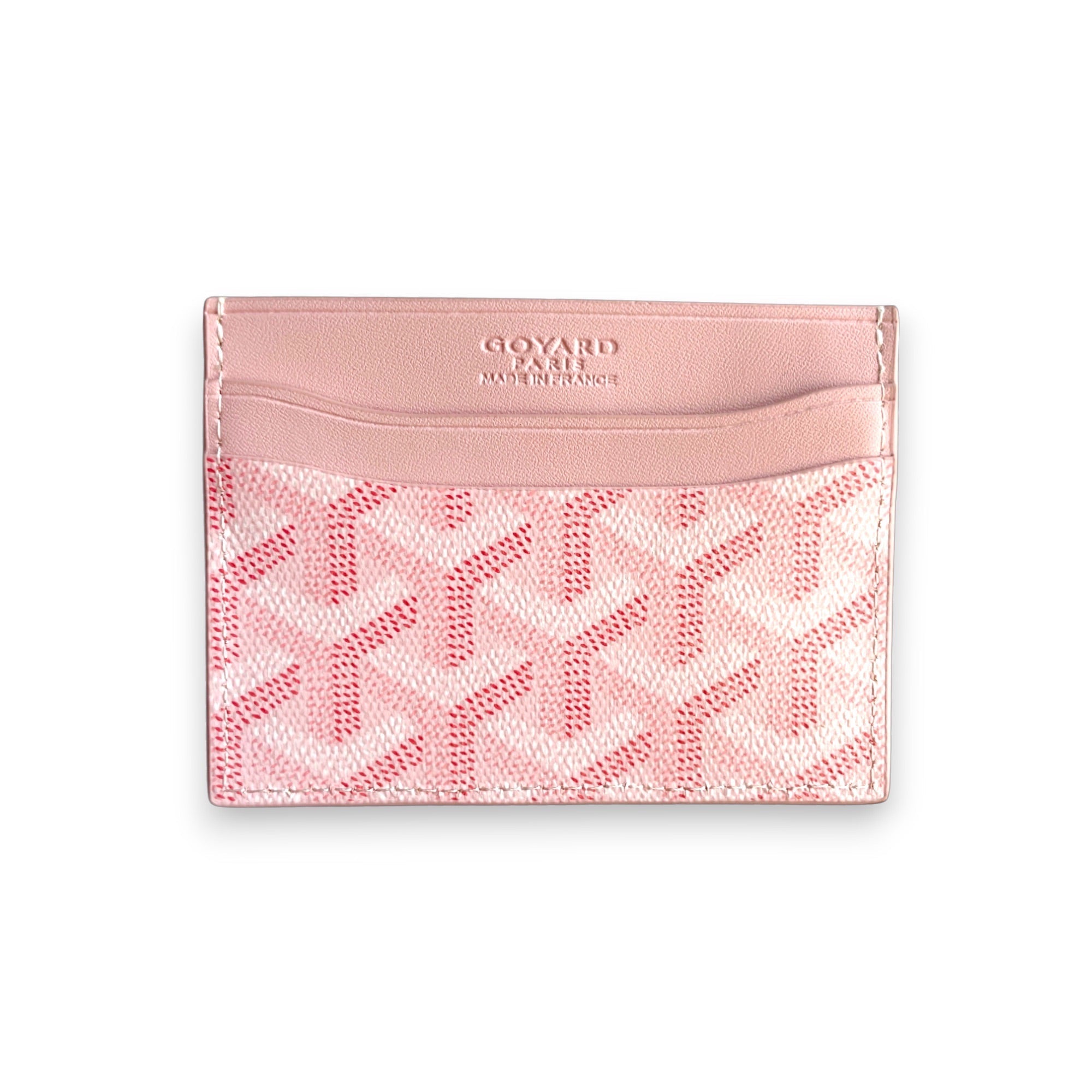 Pink Goyard card holder featuring the iconic pattern and sleek design, ideal for holding cards and cash.