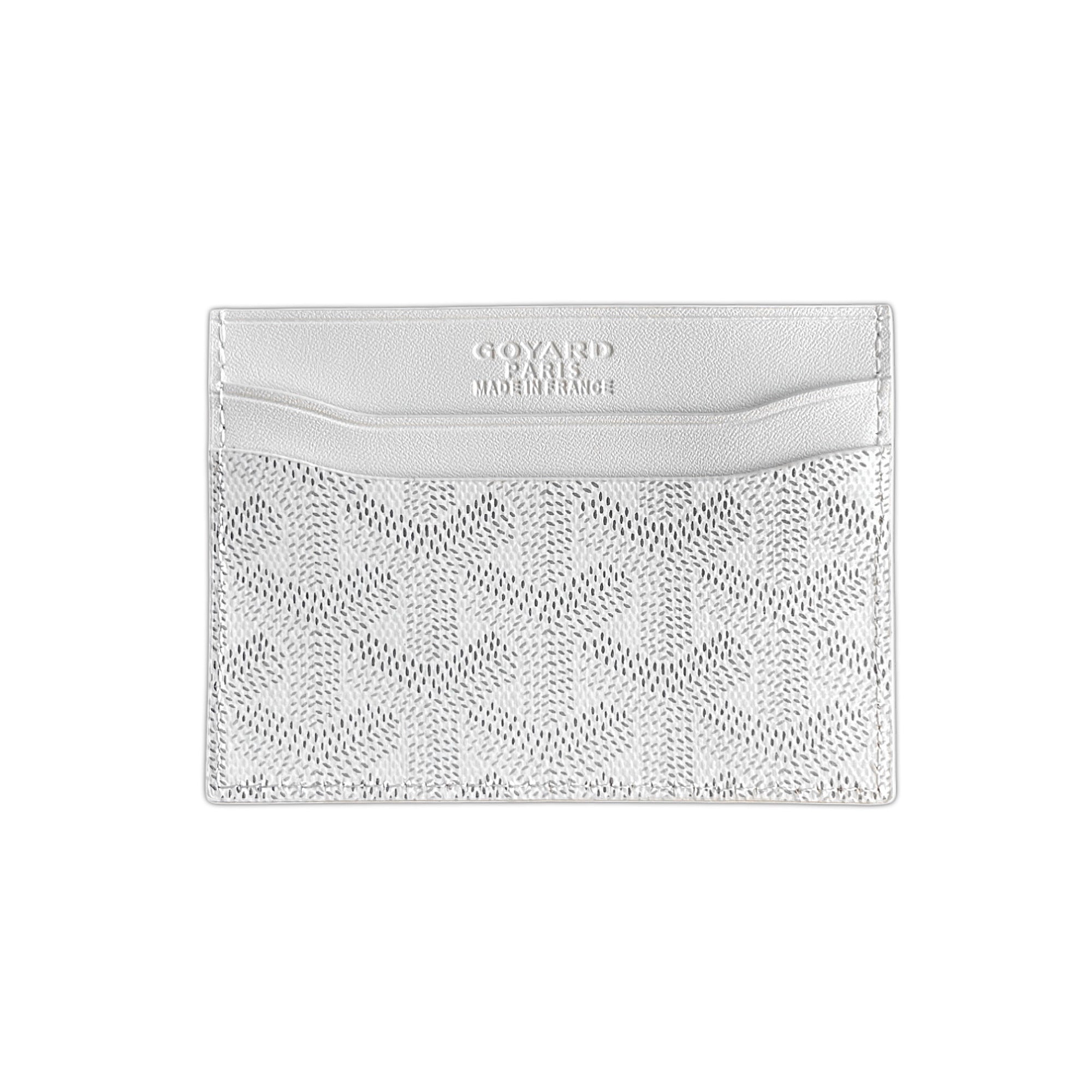 White Goyard card holder featuring the iconic monogram pattern and sleek design, perfect for stylish organization.