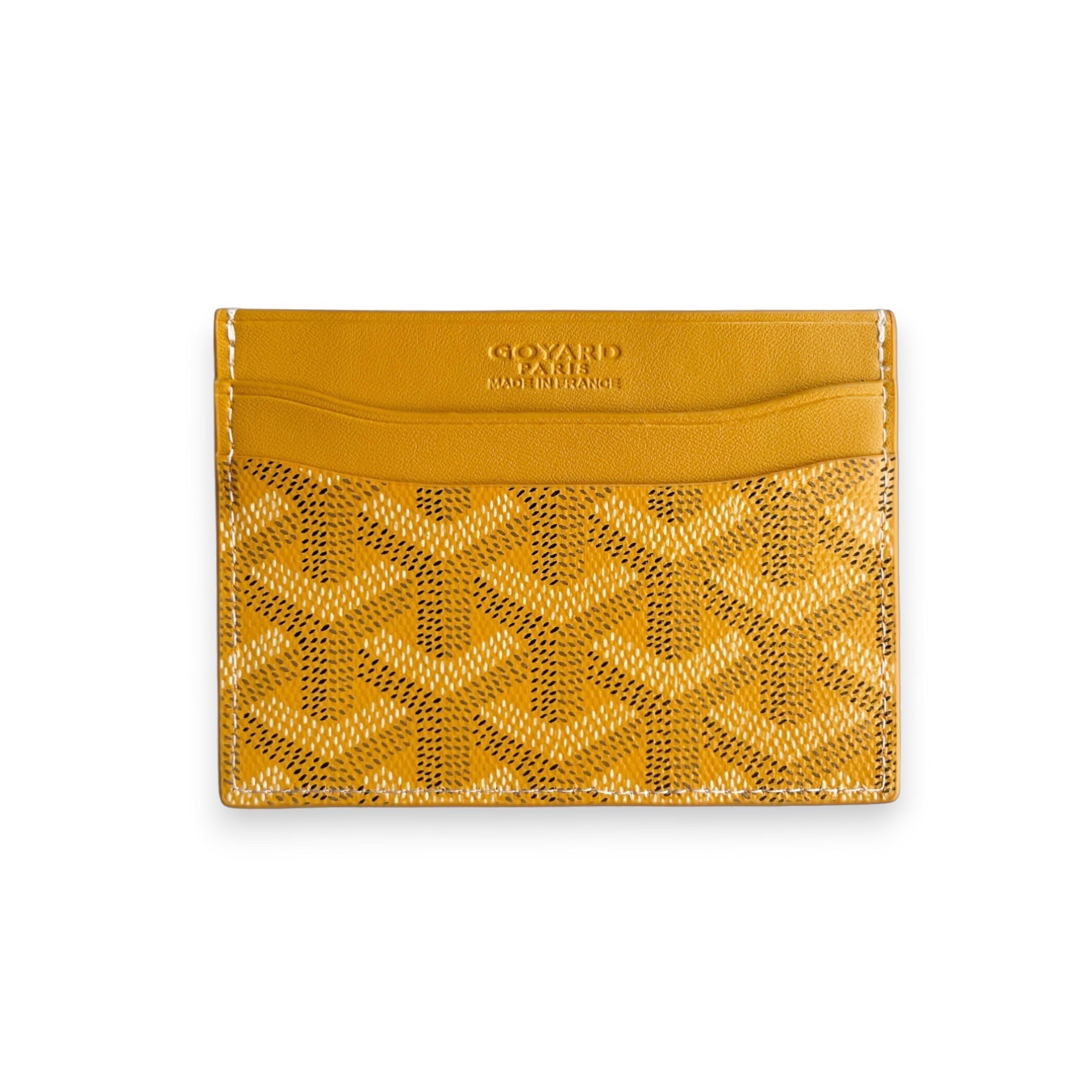 Yellow Goyard card holder featuring the iconic logo pattern and sleek design, perfect for organizing cards.
