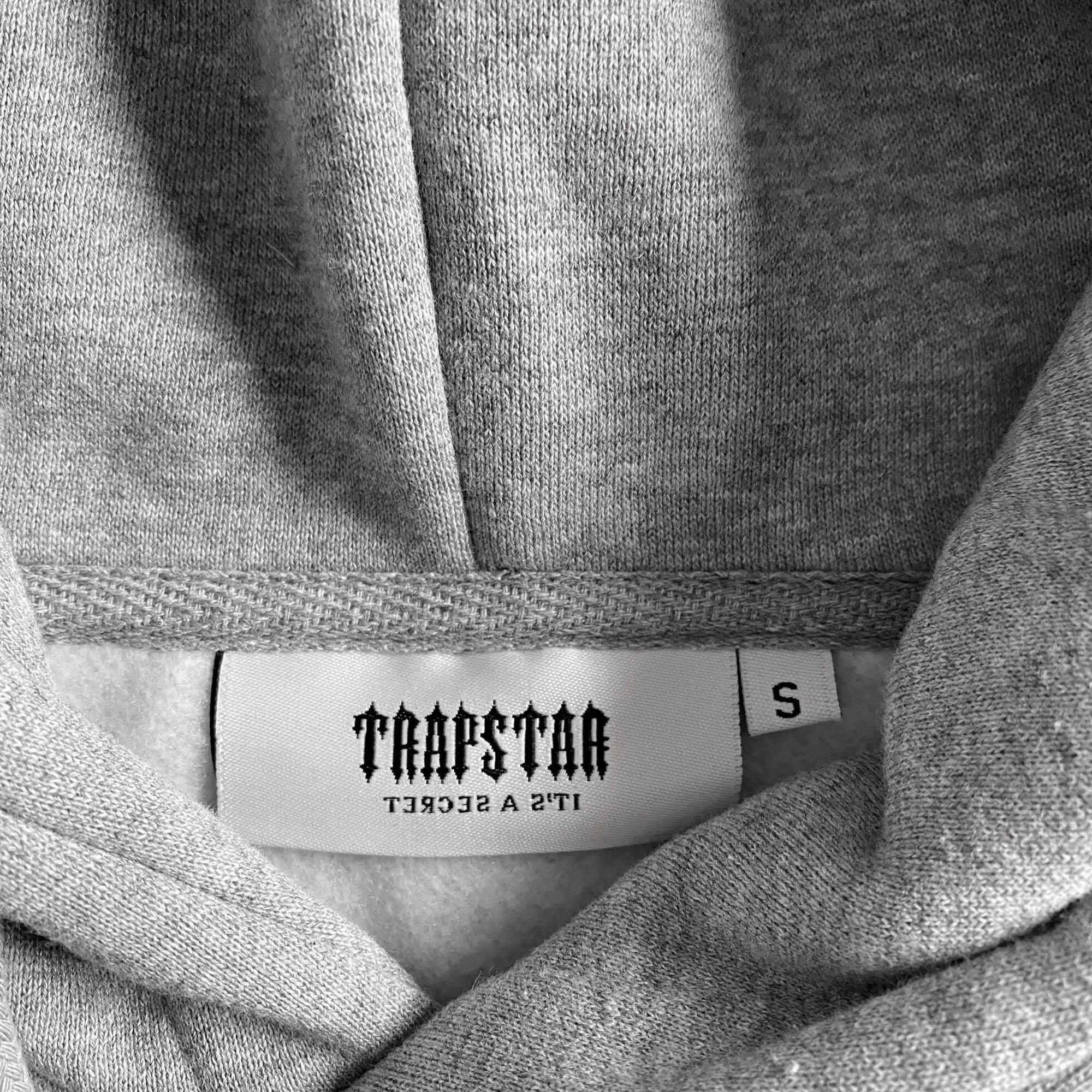 Trapstar grey ice flavours chenille tracksuit set featuring a hoodie and pants, displayed on a neutral background.