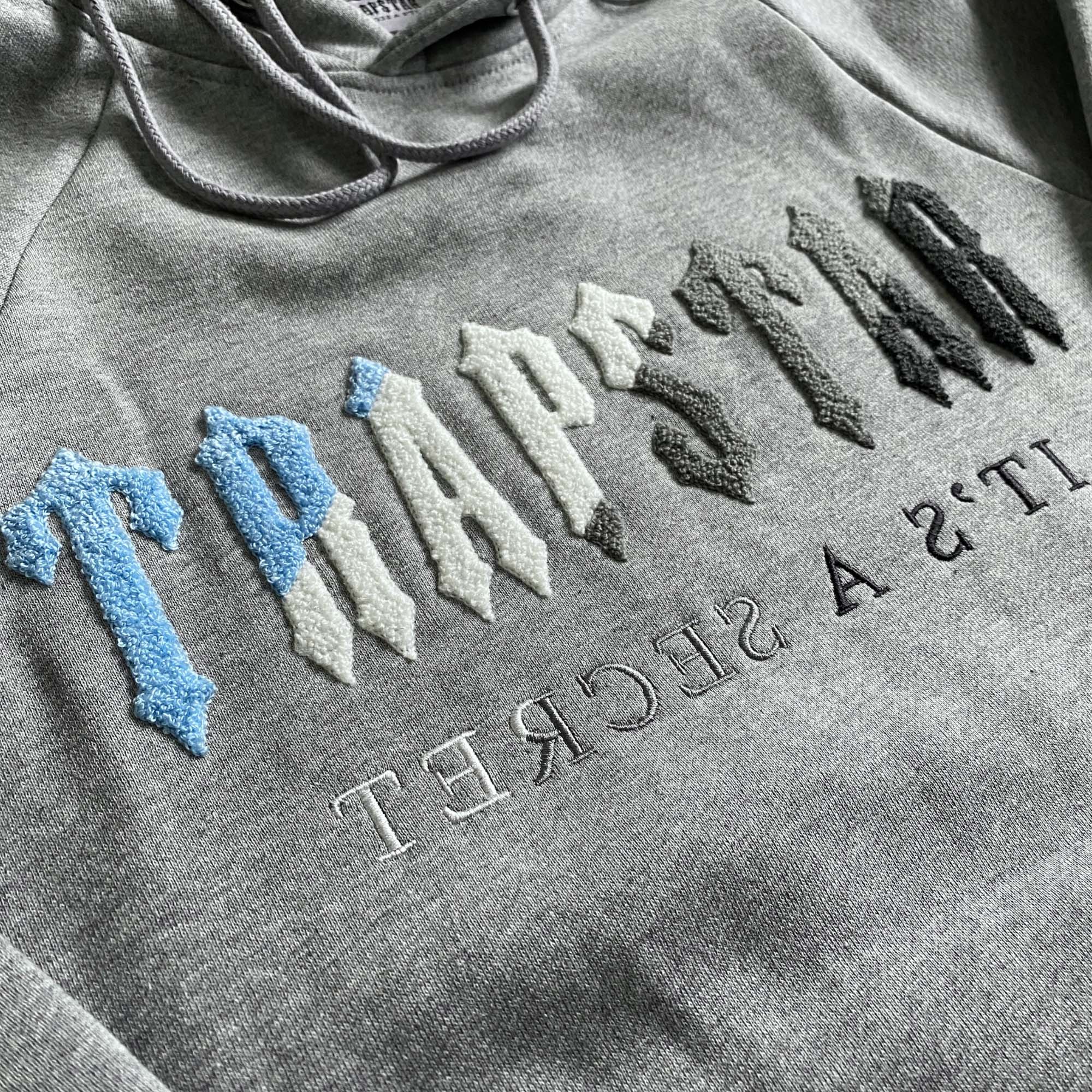 Grey Ice Flavours Trapstar Chenille tracksuit set featuring a hoodie and pants, showcasing a cozy, stylish design.