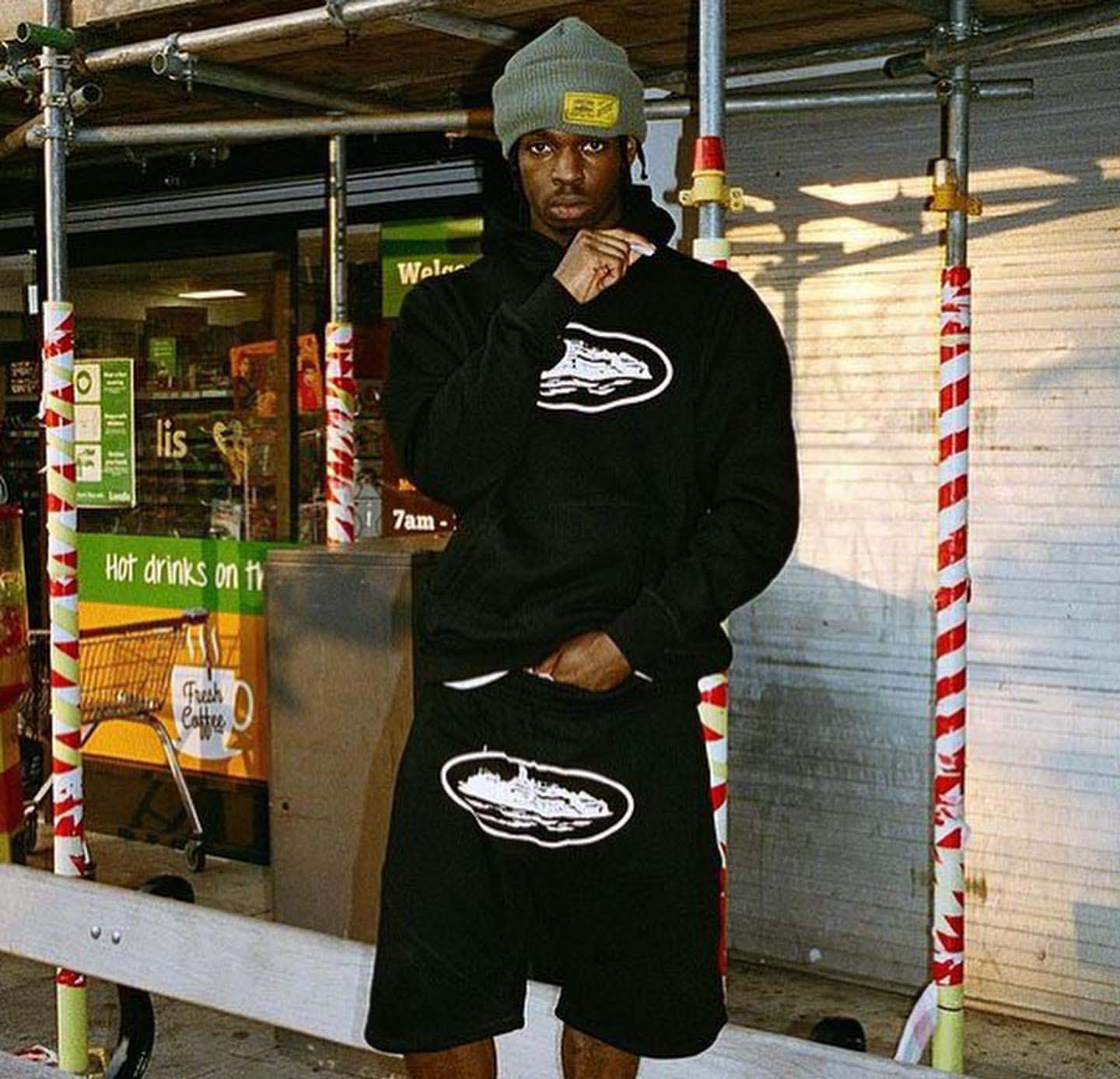 Black Corteiz Alcatraz hoodie featuring a stylish design and comfortable fit, perfect for casual wear.