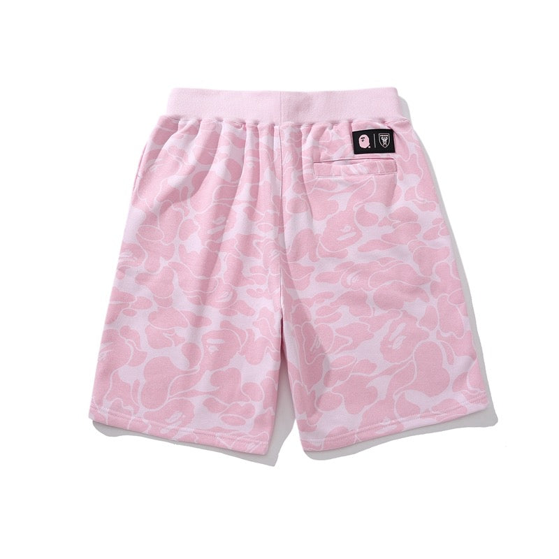 BAPE x Inter Miami pink camo shorts featuring a relaxed fit and stylish design from Central ae.
