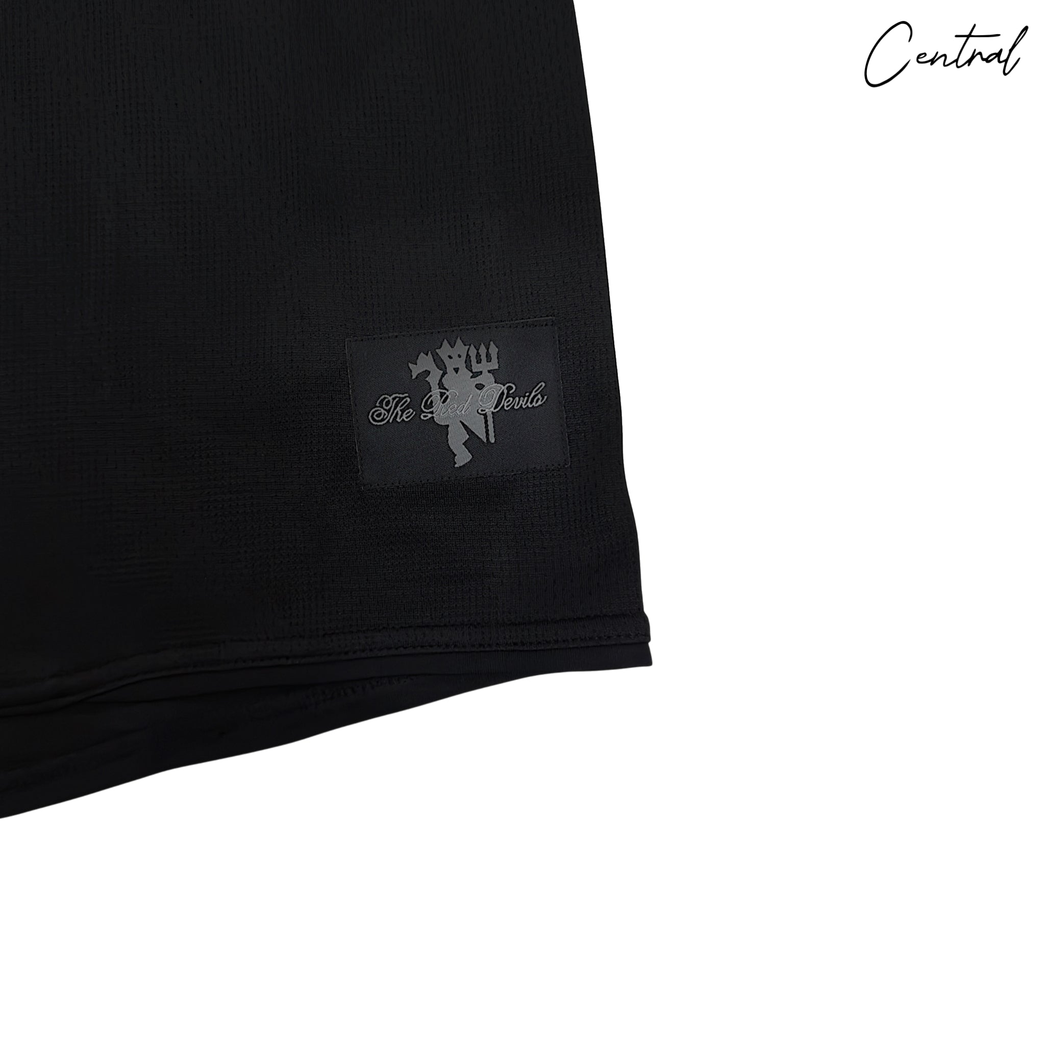 2007-08 Manchester United long-sleeve away shirt by Central Ae, featuring team colors and logo on a classic design.