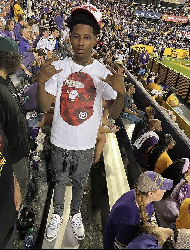 BAPE Color Camo Big Ape Head Tee in white and red featuring a large ape graphic on the front.