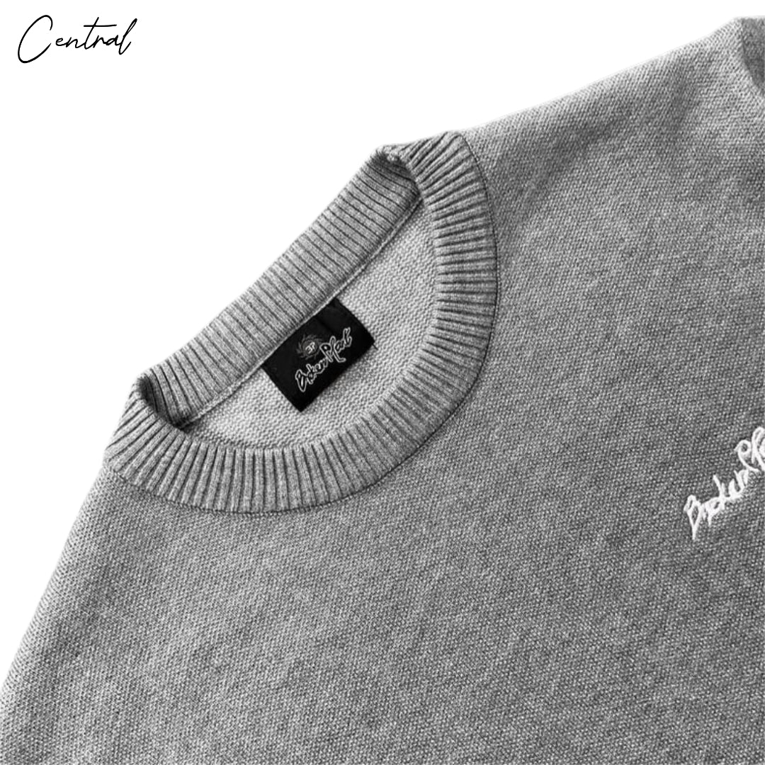 Heather grey Broken Planet knit sweater by Central Ae, featuring a cozy texture and relaxed fit.