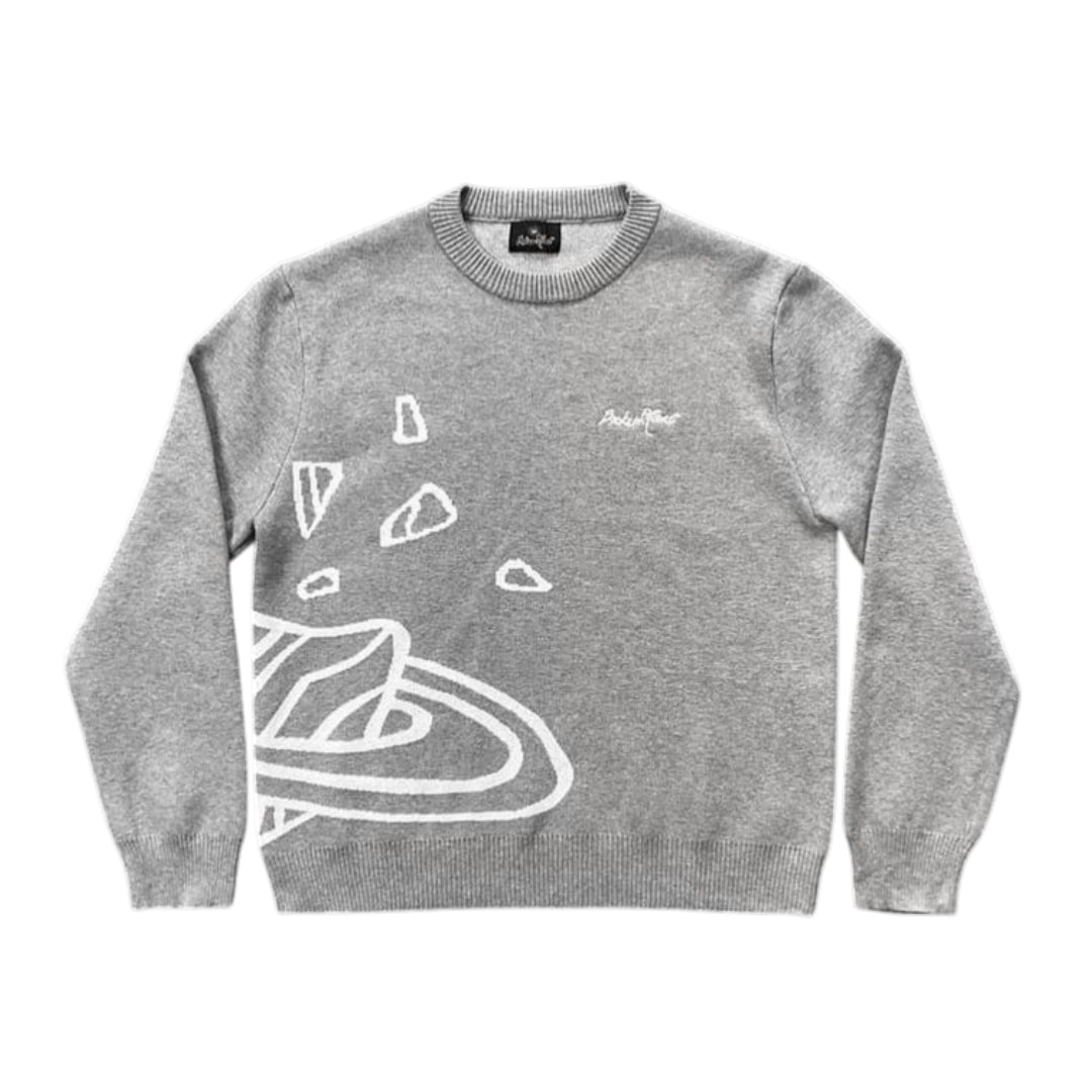 Heather grey Broken Planet knit sweater by Central Ae displayed on a mannequin with a cozy texture and relaxed fit.