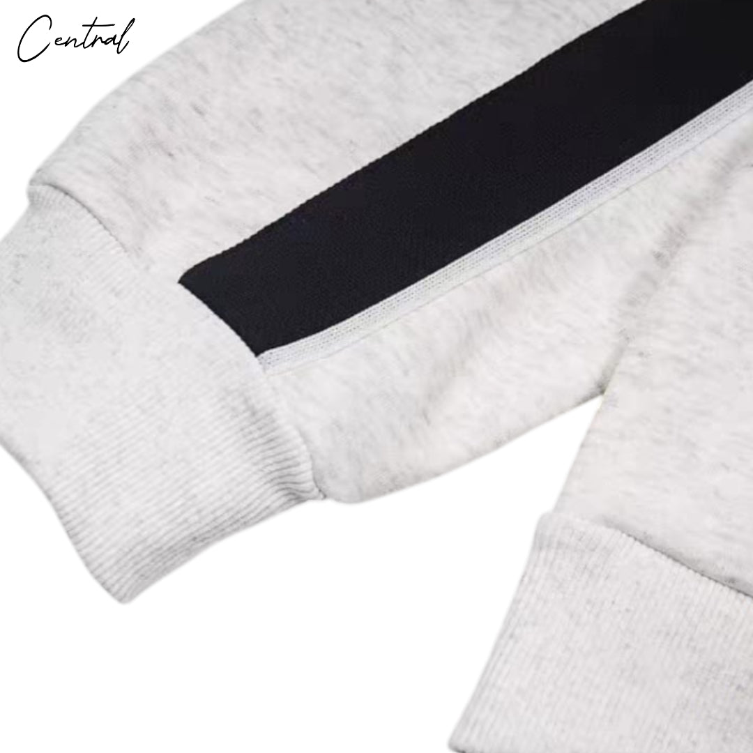 Corteiz Ribbed Sporteiz Zip Hoodie in grey with a fitted design and zip closure, showcasing ribbed texture and hood.