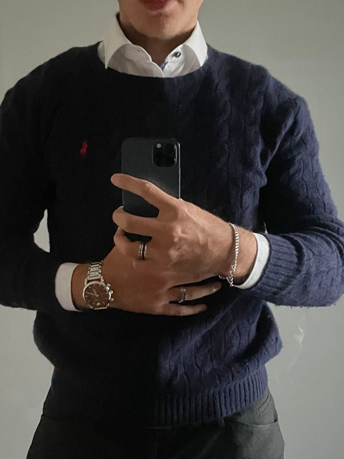 Navy cable-knit cotton jumper by Polo Ralph Lauren, showcasing a classic design and textured fabric.