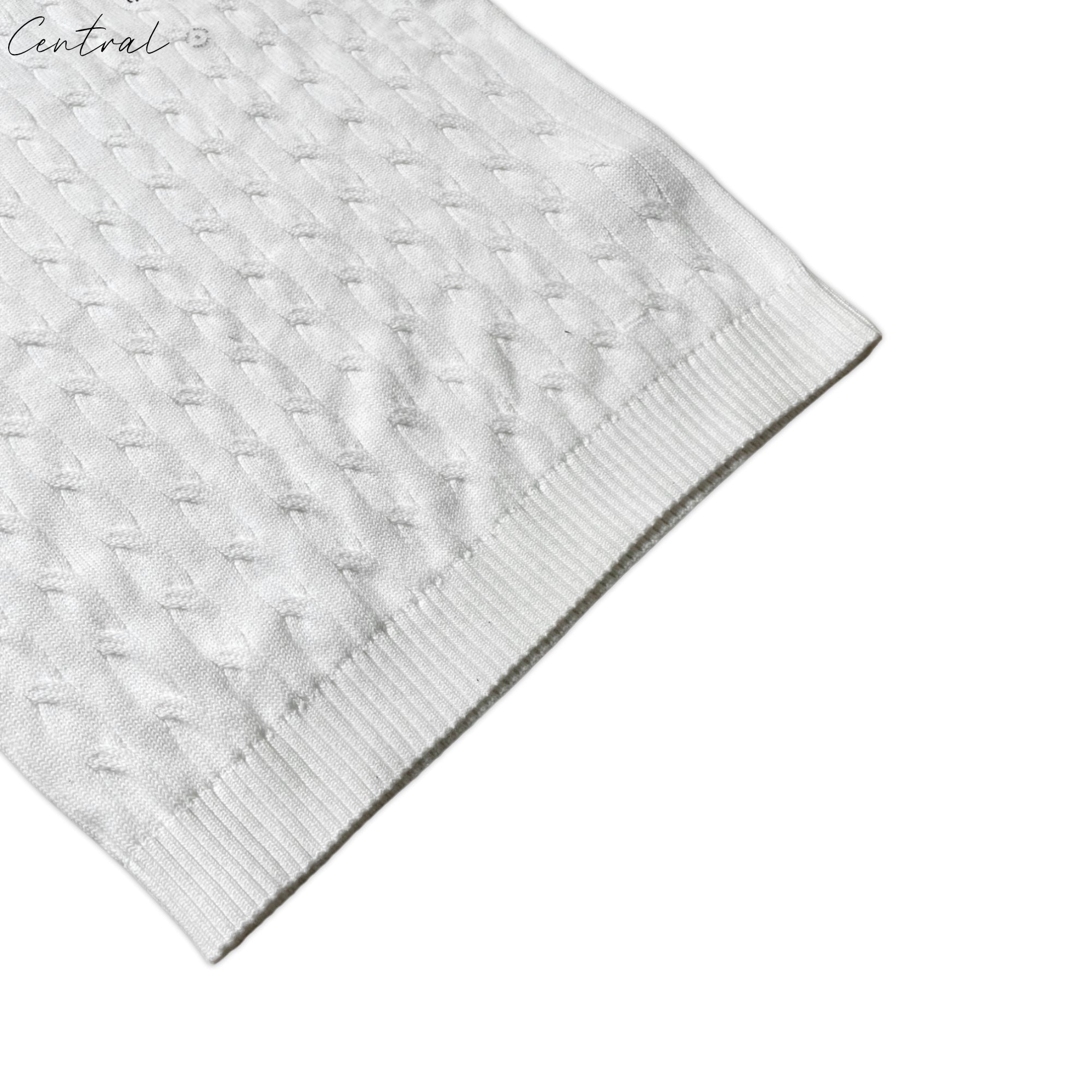 White cable-knit cotton jumper by Polo Ralph Lauren, featuring a classic design and textured knit pattern.