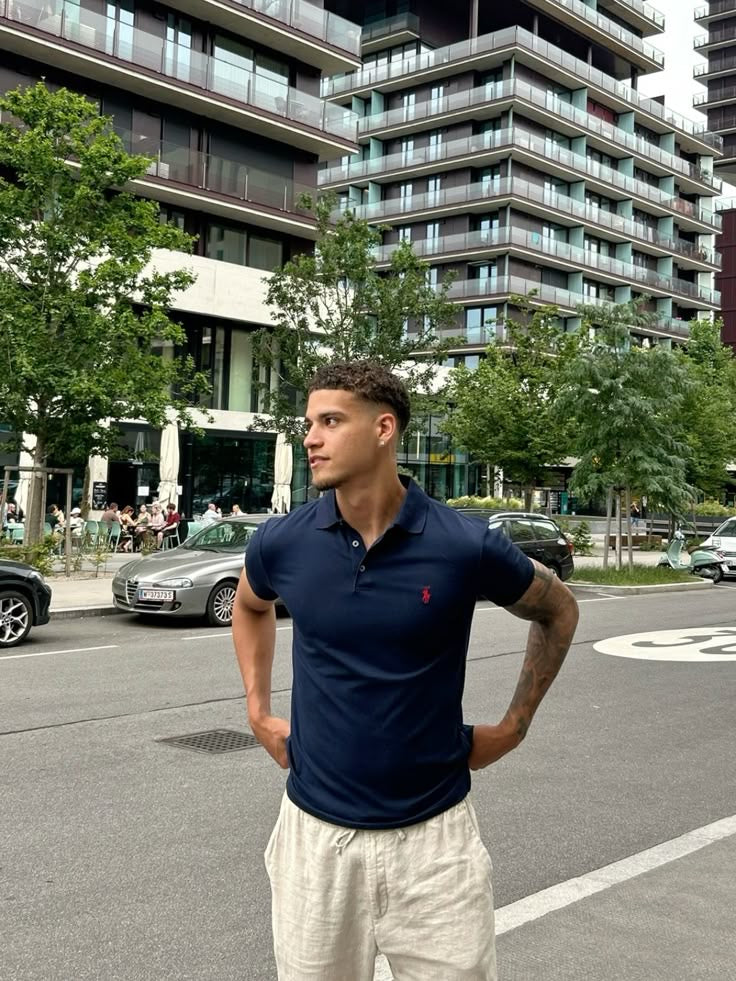 Ralph Lauren navy polo shirt displayed on a hanger with a classic fit and embroidered logo.