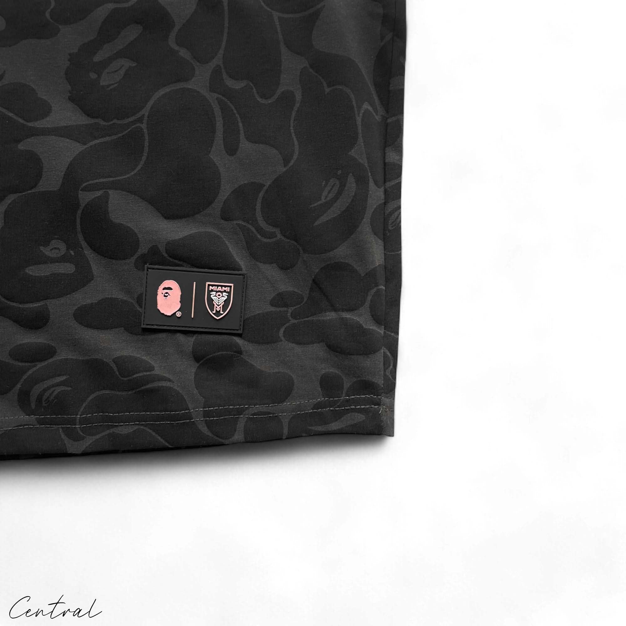 Black BAPE x Inter Miami camo T-shirt featuring a bold camouflage pattern and Central ae branding.