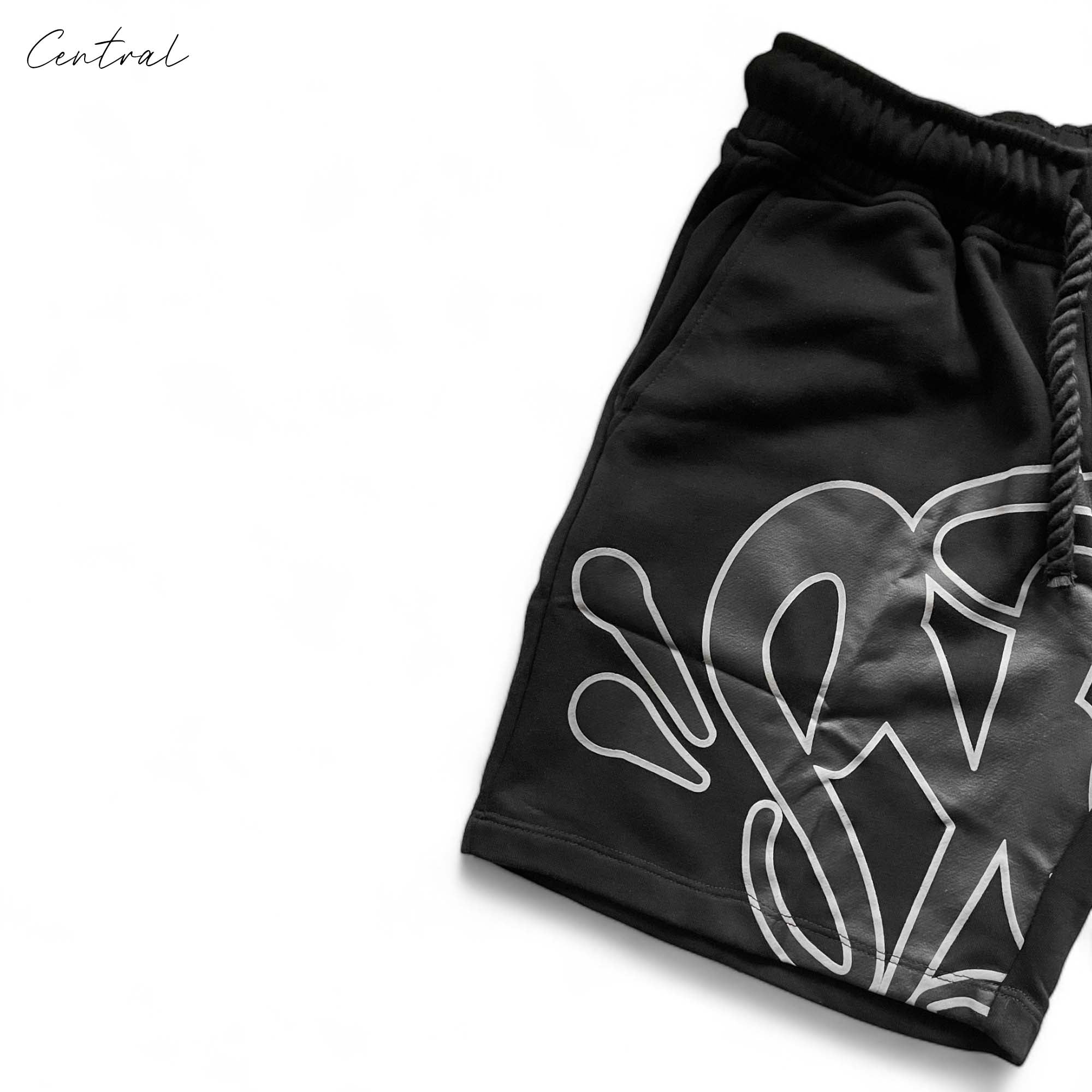 Black Syna World short set featuring a comfortable t-shirt and shorts by Central ae, ideal for casual wear.