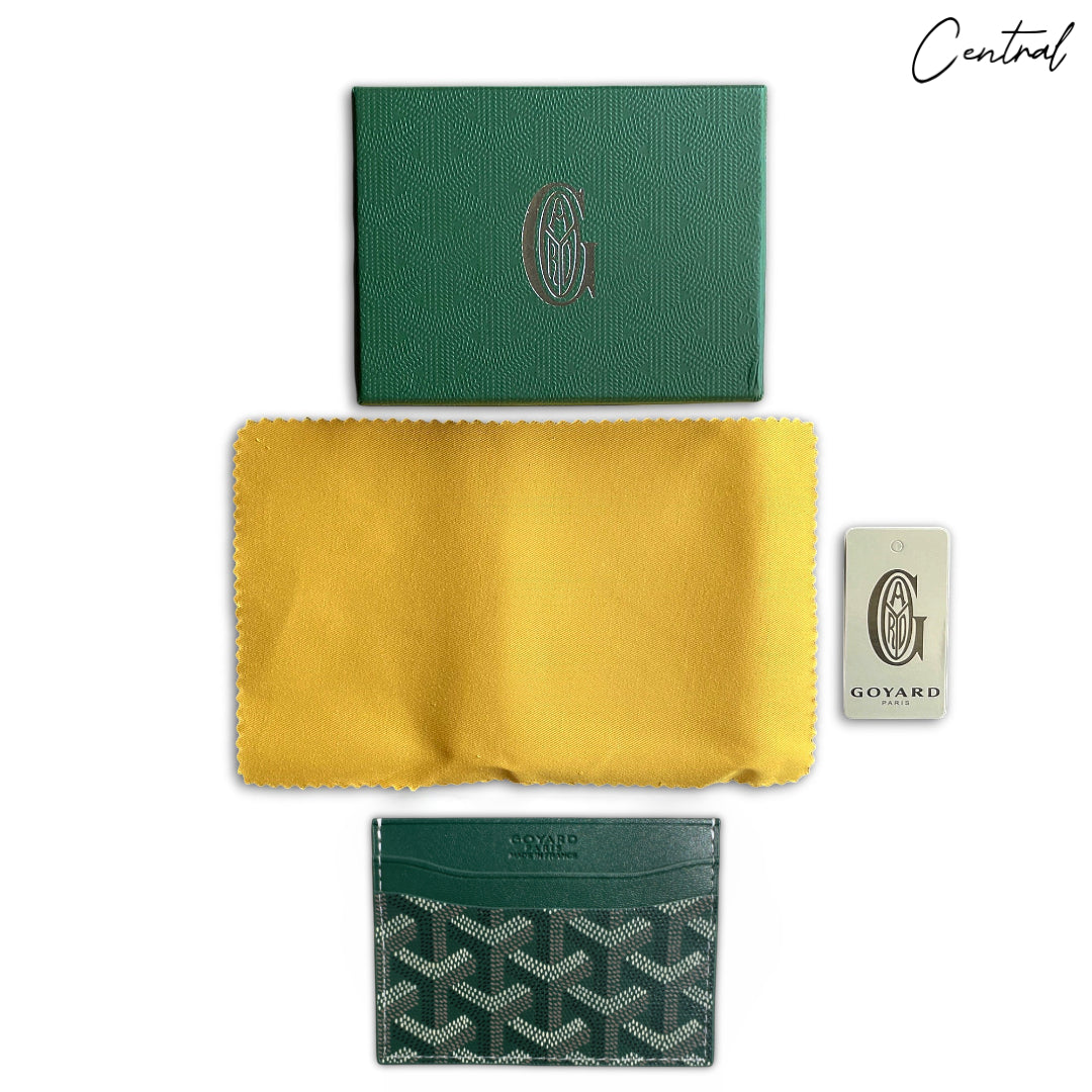 Green Goyard card holder wallet featuring signature pattern and sleek design, ideal for organizing cards and essentials.