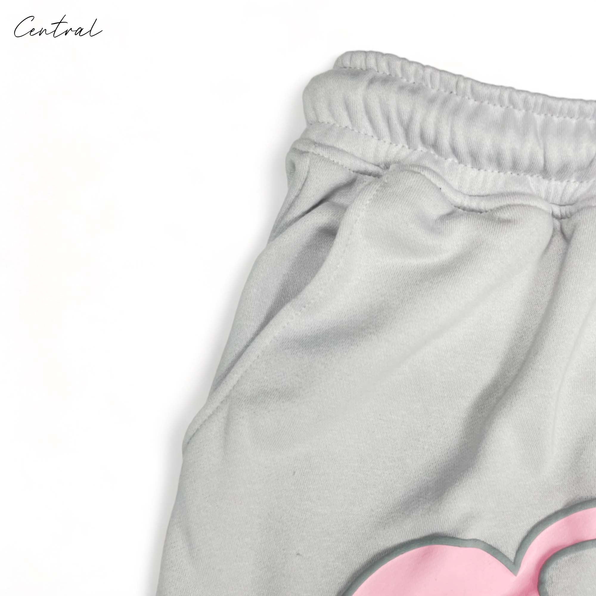 Gray and pink Syna World short set featuring a t-shirt and shorts by Closed, displayed on a neutral background.