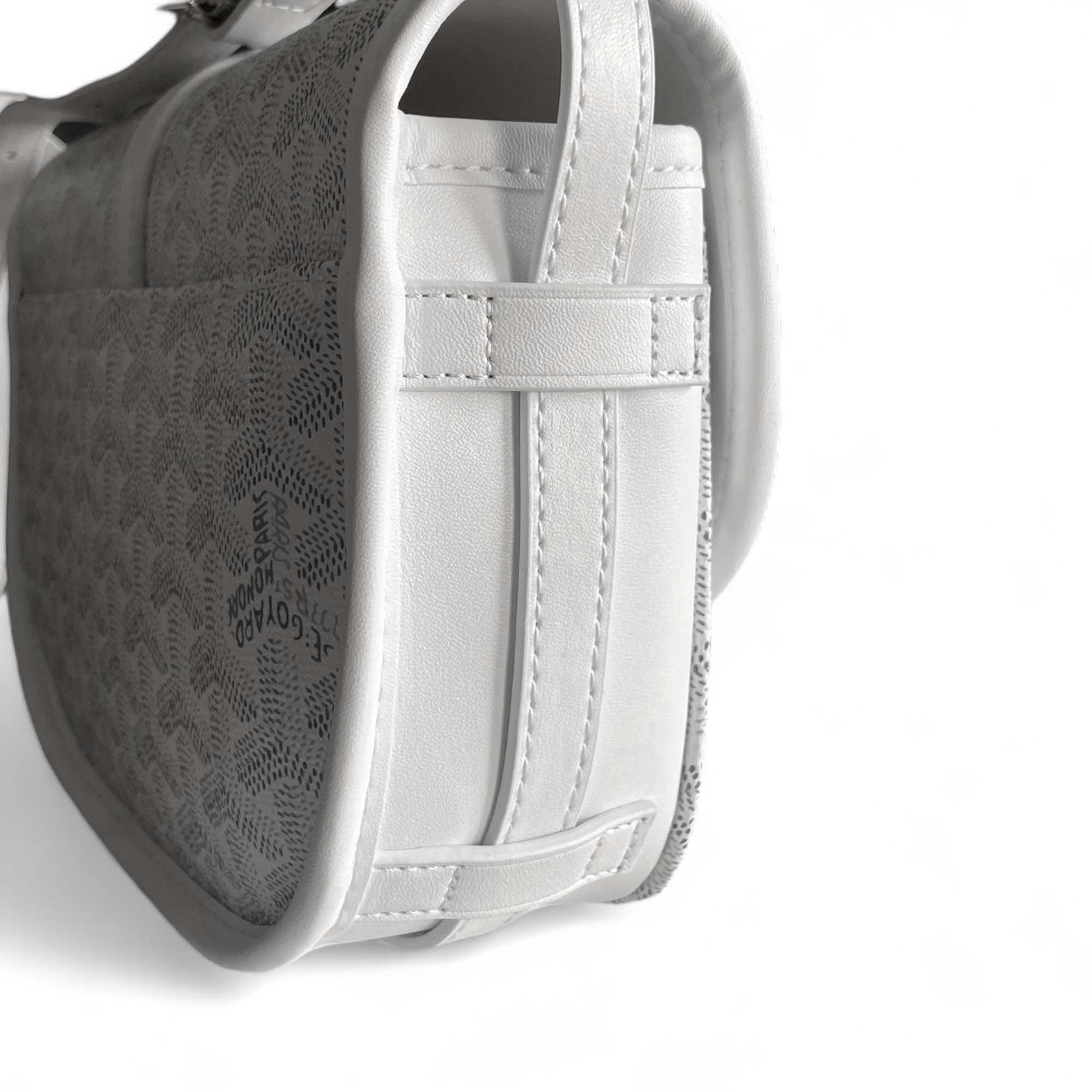 White Goyard bag from Central ae featuring a stylish design and signature logo pattern.