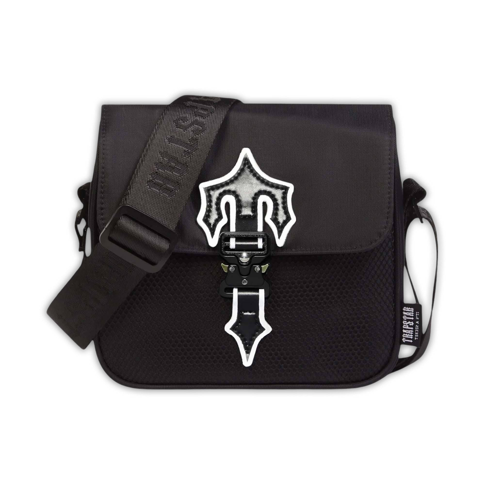 Trapstar black and white Irongate T cross-body bag with adjustable strap and logo detail.