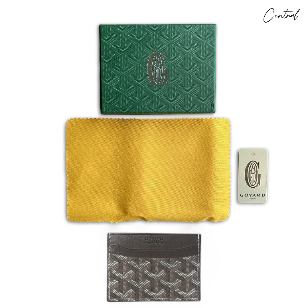 Goyard coffee brown card holder featuring signature canvas pattern and sleek design.