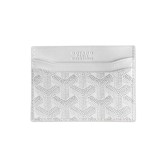 White Goyard card holder featuring the iconic monogram pattern and sleek design, perfect for stylish organization.
