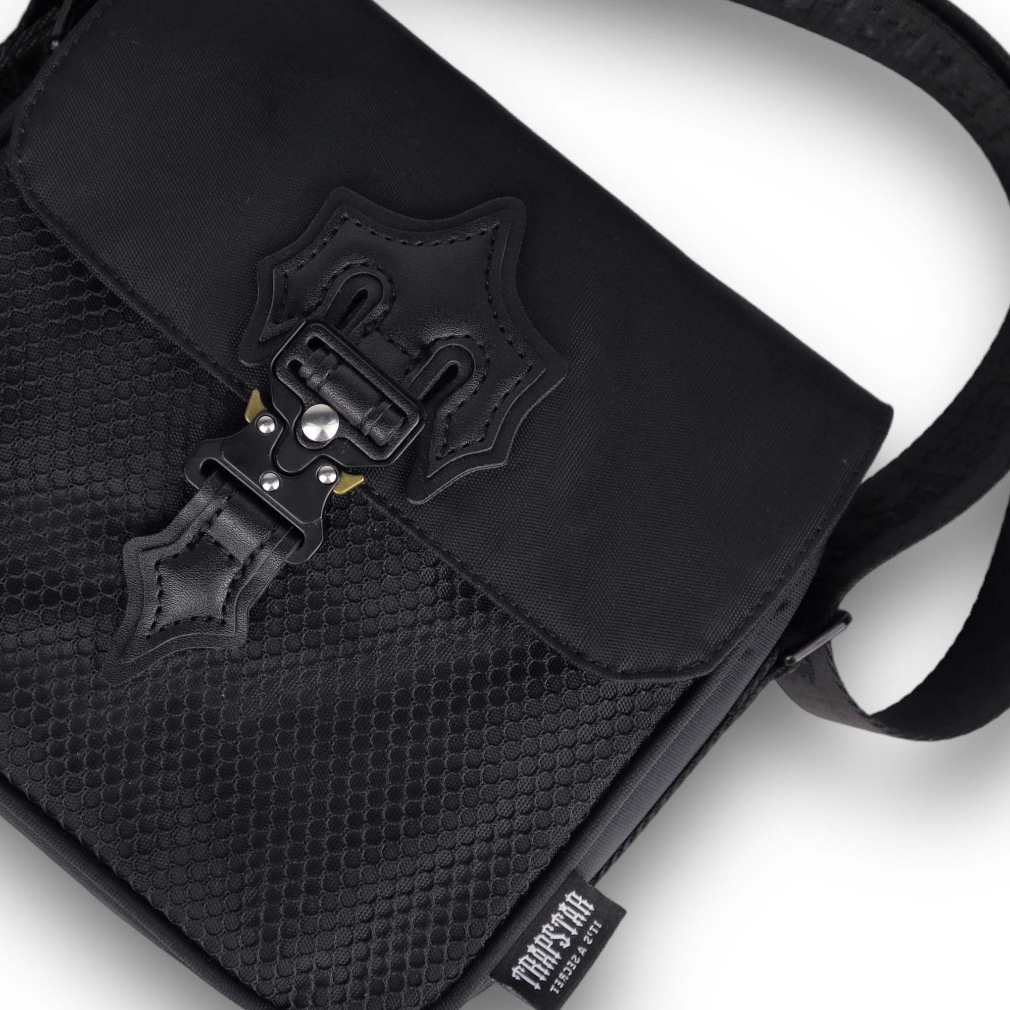 Trapstar Black Edition Irongate T Cross-Body Bag by Central ae, featuring sleek black design and adjustable strap.