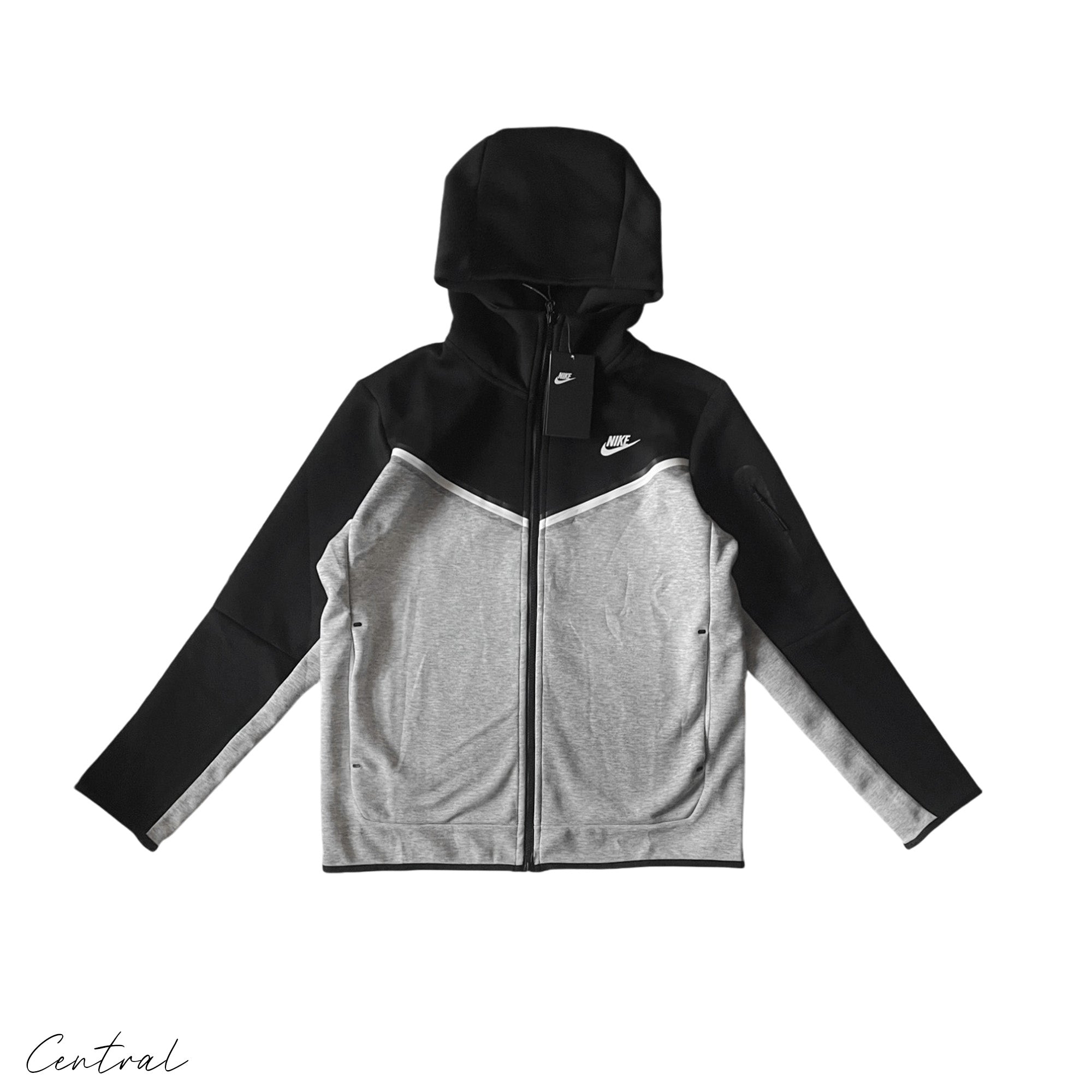 Nike Tech Fleece hoodie and pants set in grey and black, showcasing a modern athletic style and comfortable fit.