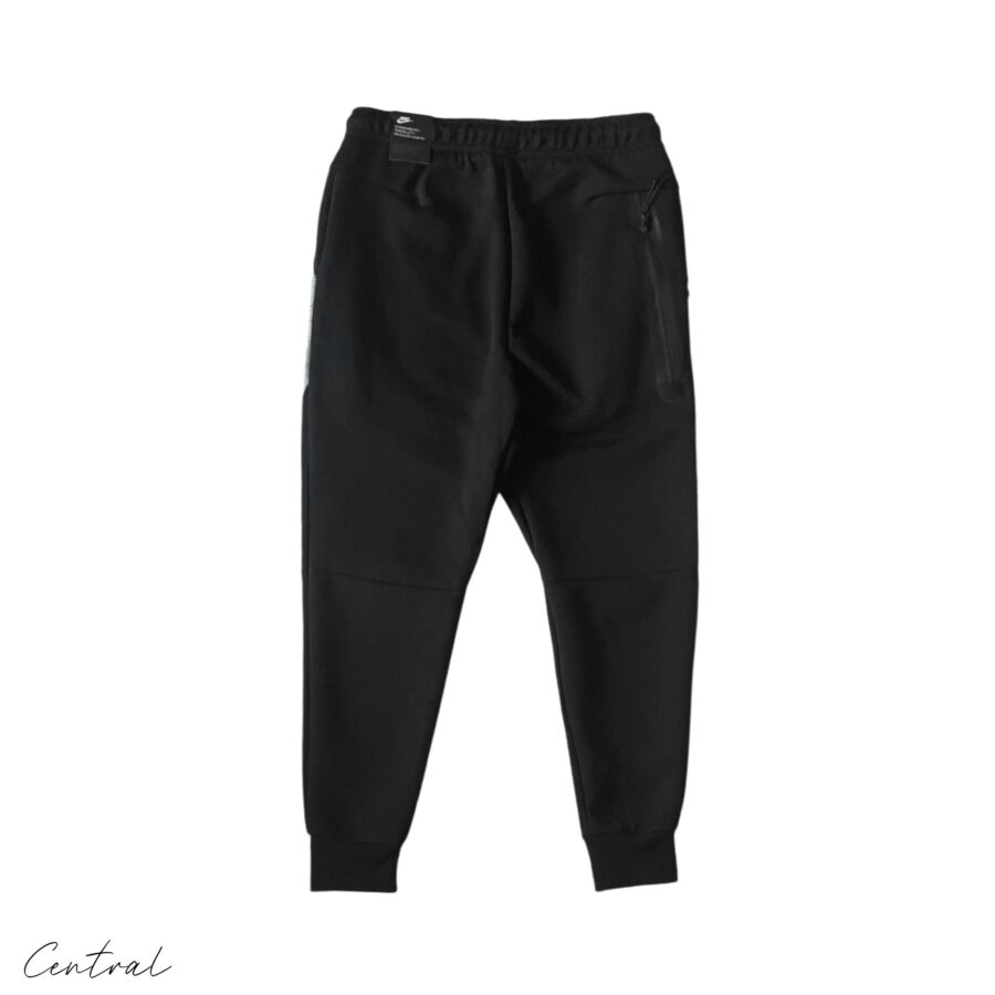 Nike Tech Fleece hoodie and pants set in grey and black, showcasing a comfortable and stylish athletic outfit.