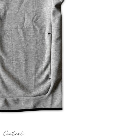 Nike Tech Fleece grey and black tracksuit set featuring a hoodie and pants, showcasing a stylish athletic look.