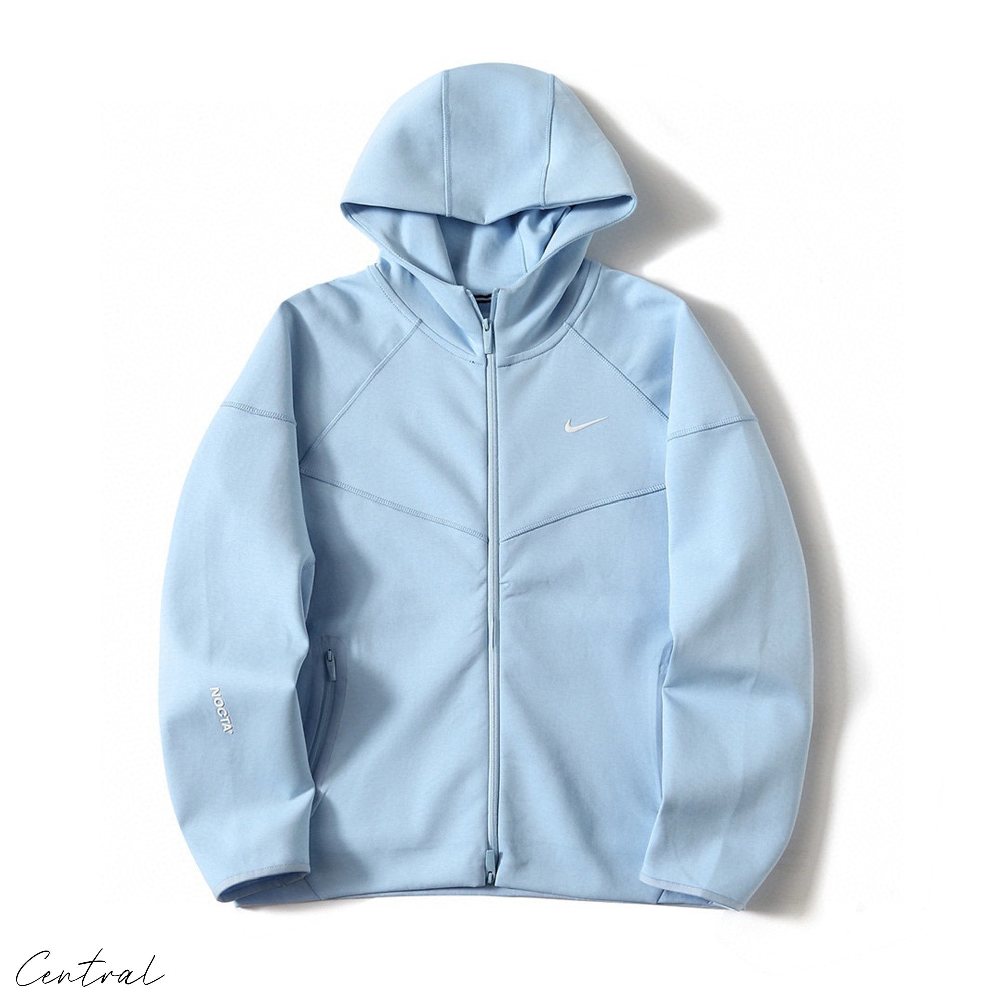 Central ae NOCTA Tech Fleece hoodie and pants set in a casual style, featuring a comfortable fit and soft fabric.