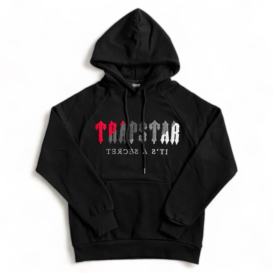 Black and red Trapstar chenille decoded tracksuit featuring a hoodie and pants set, showcasing a stylish streetwear look.