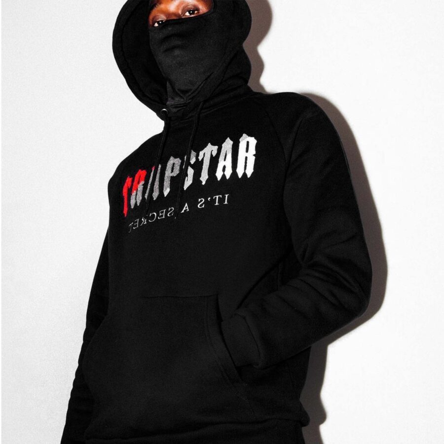 Black and red Trapstar chenille decoded tracksuit set featuring a hoodie and pants.