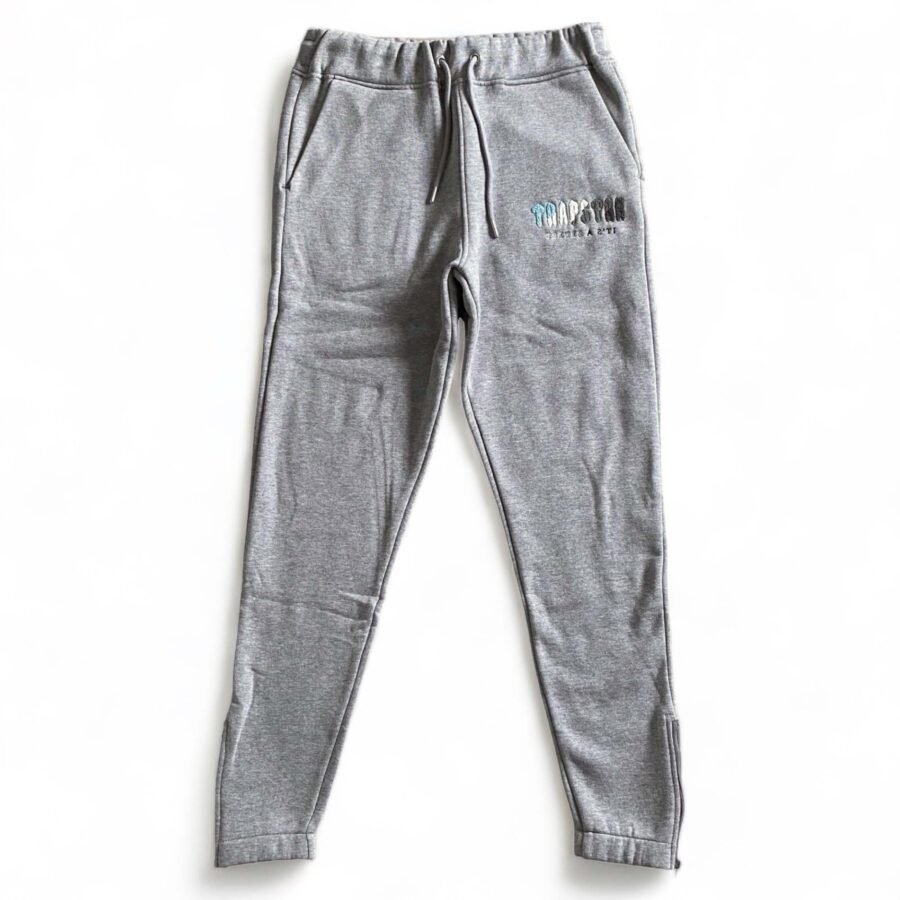 Trapstar Chenille Decoded tracksuit in grey, featuring a hoodie and pants set, displayed on a neutral background.