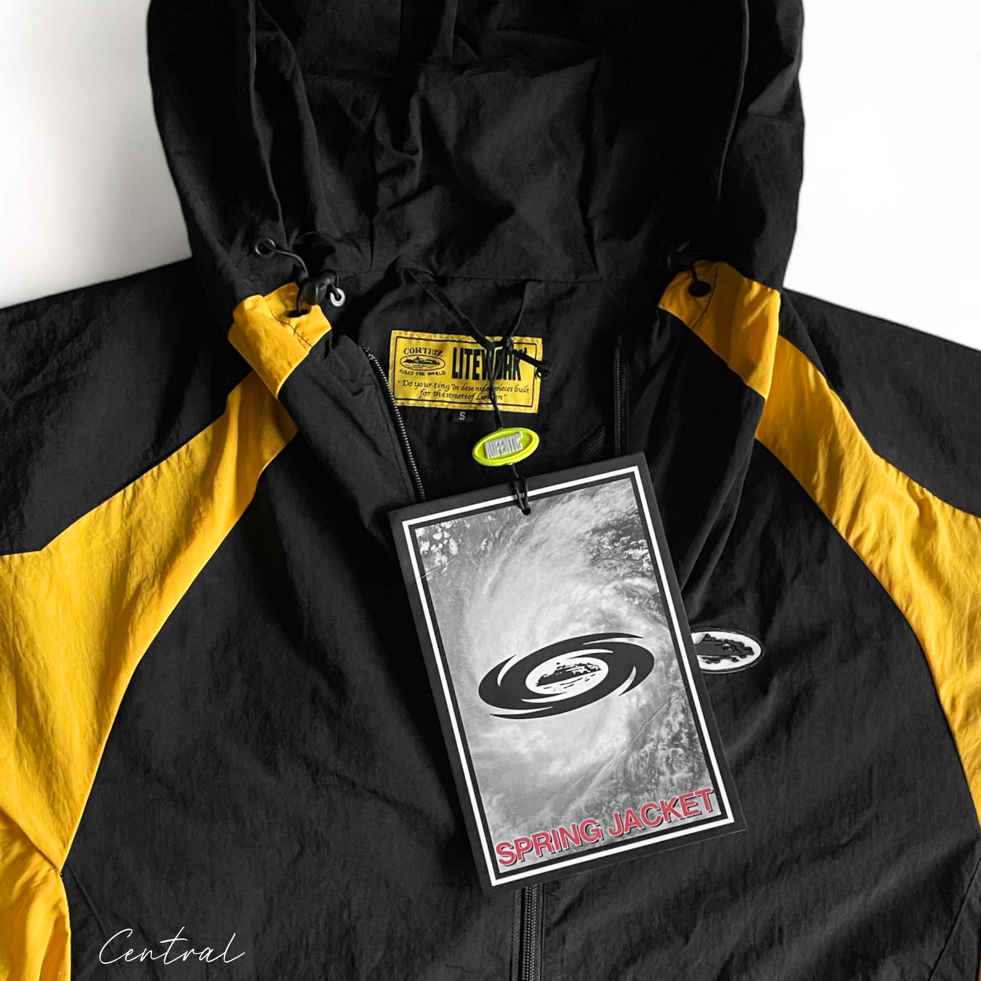 Central ae black and yellow Corteiz Spring jacket hoodie with a stylish design and comfortable fit.
