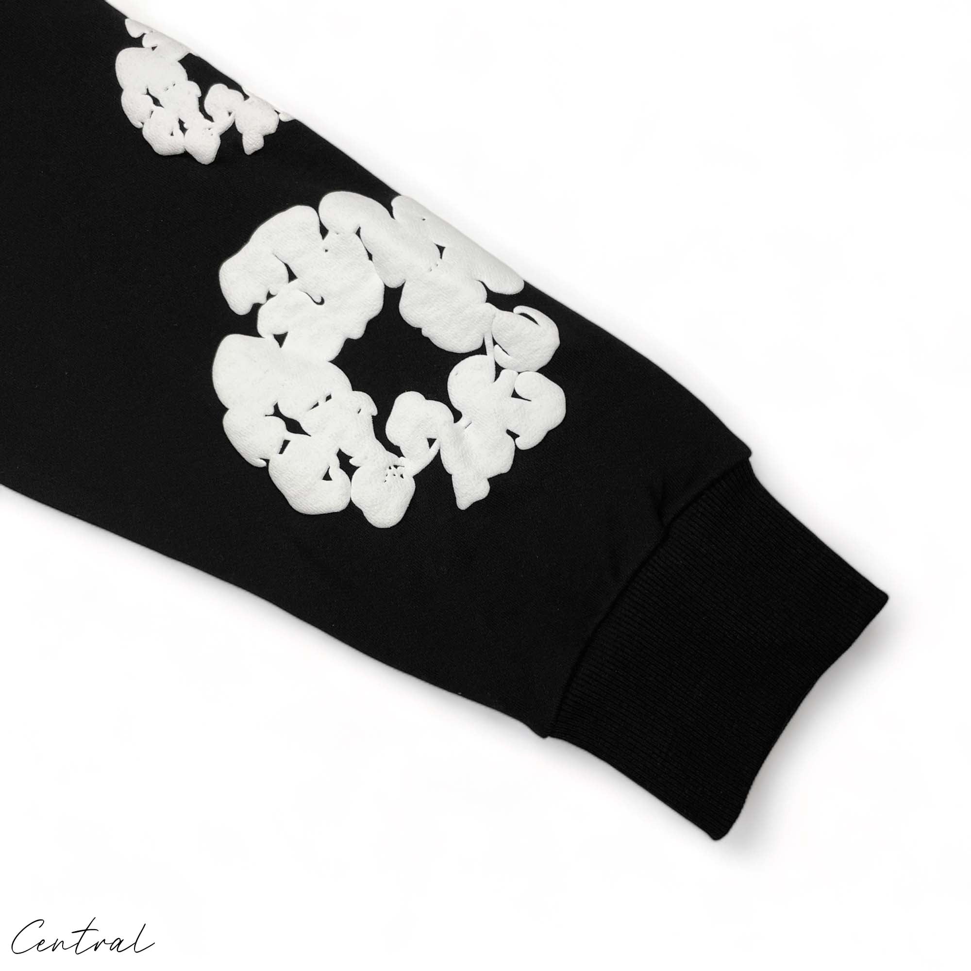 Black hoodie from Central AE featuring a unique cotton wreath design by Denim Tears.