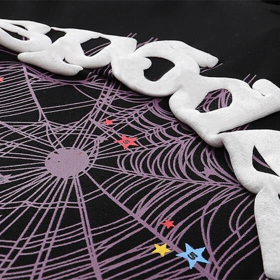 Central ae Sp5der Web Hoodie featuring a unique web design and a comfortable fit, displayed on a hanger.