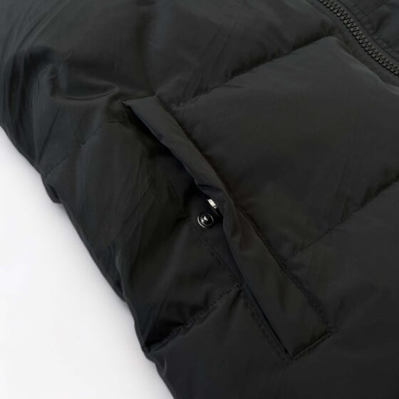 Trapstar Irongate black detachable hooded puffer jacket with a sleek design and textured fabric.
