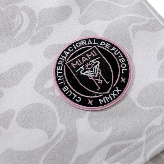 BAPE x Inter Miami white camo shorts featuring a unique camouflage pattern and relaxed fit by Central ae.