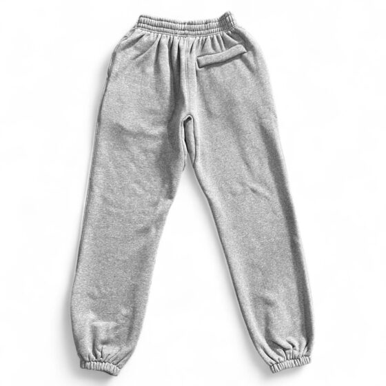 Gray Corteiz Alcatraz sweatpants featuring a relaxed fit and elastic waistband, perfect for casual wear.