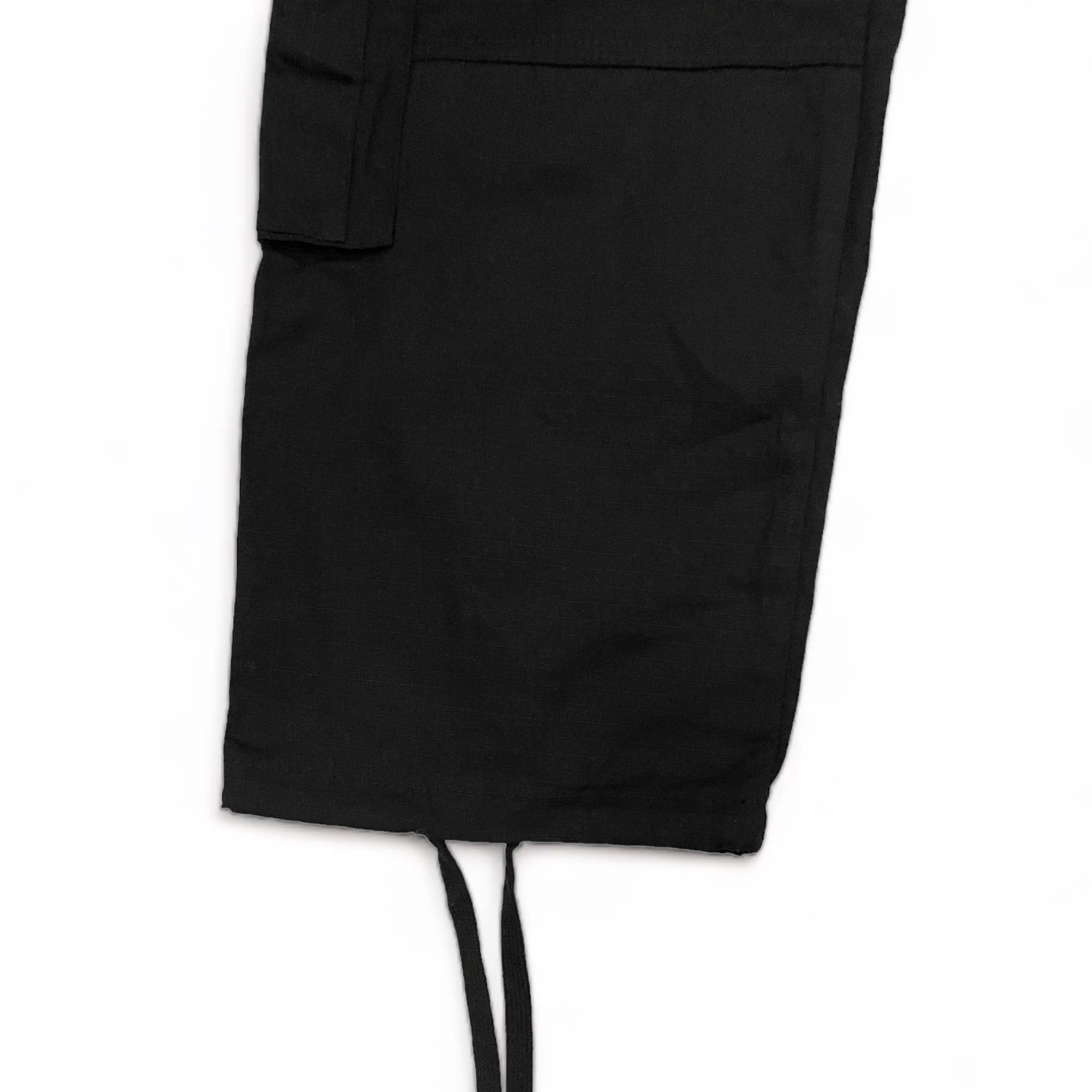 Corteiz cargo pants in olive green with multiple pockets and a relaxed fit, showcasing casual streetwear style.
