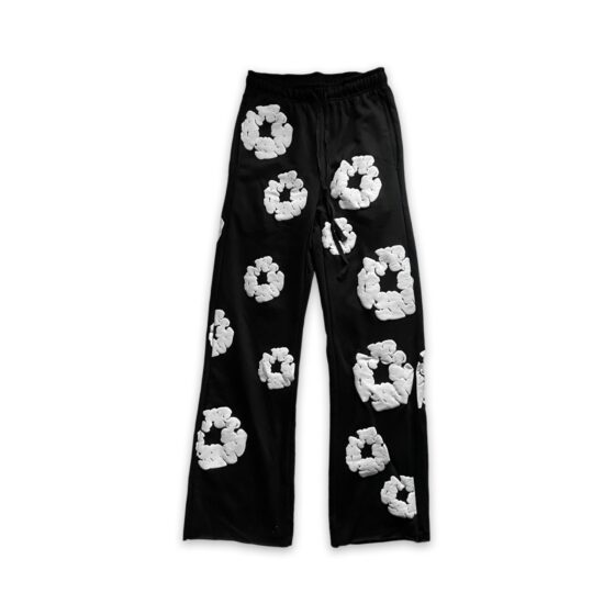 Black READYMADE x DENIM TEARS sweatpants in size M, featuring a relaxed fit and unique design details.