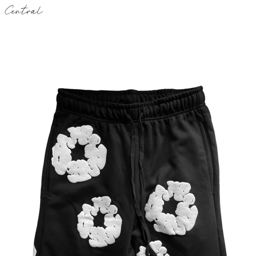Black READYMADE x DENIM TEARS sweatpants in size M, featuring a relaxed fit and unique design details.