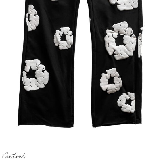 Black READYMADE x DENIM TEARS sweatpants in size M, featuring a relaxed fit and unique design elements.