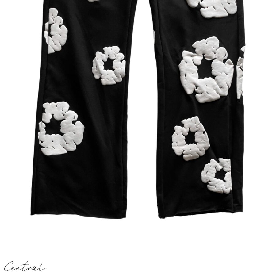 Black READYMADE x DENIM TEARS sweatpants in size M, featuring a relaxed fit and unique design elements.
