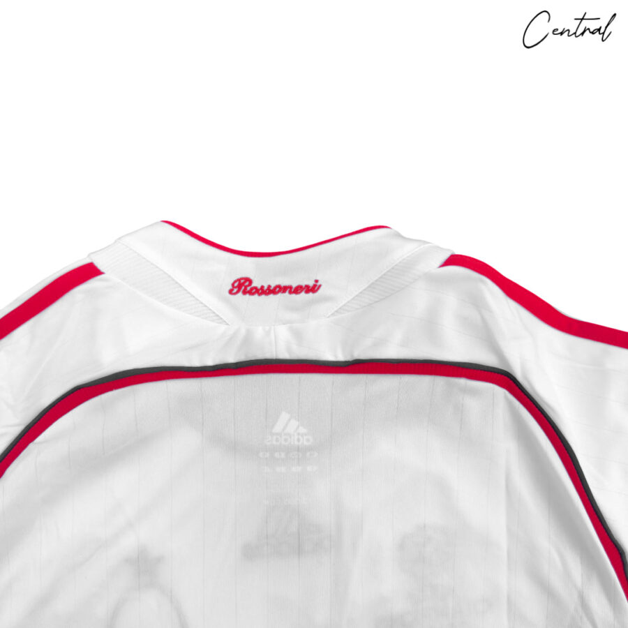 AC Milan 2006/07 UCL Final away retro jersey featuring Bwin logo and classic design in black and red.