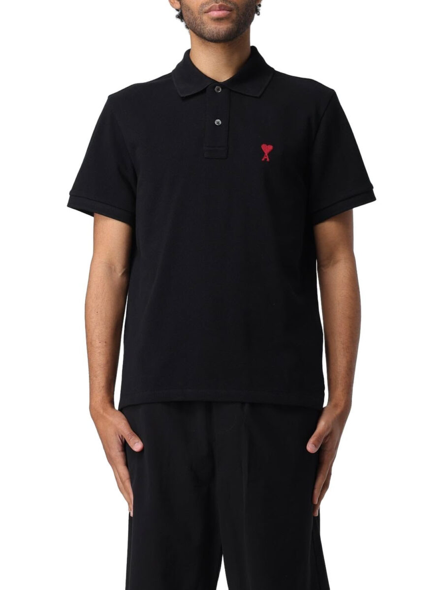 Ami Paris ADC embroidered polo shirt in navy blue, featuring a classic collar and detailed embroidery on the chest.