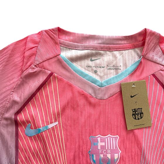 Barcelona 25/26 special edition pink kit for players, featuring the team logo and sleek design details.