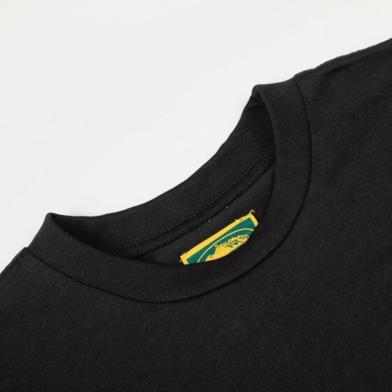 Corteiz x BBK Royale Tee in black featuring a bold logo design from Central Ae, laid flat for display.